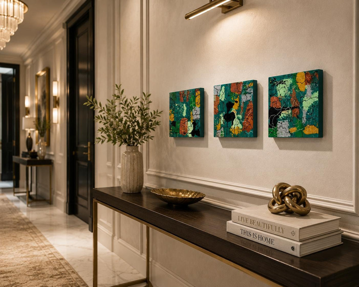 Three Emerald Mosaic 4×4 abstract wood panels displayed together above a hallway console
